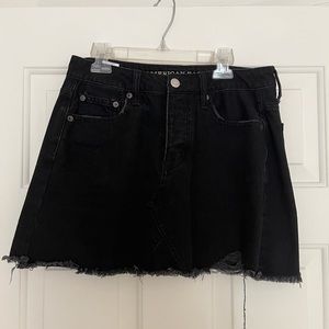 Black denim skirt